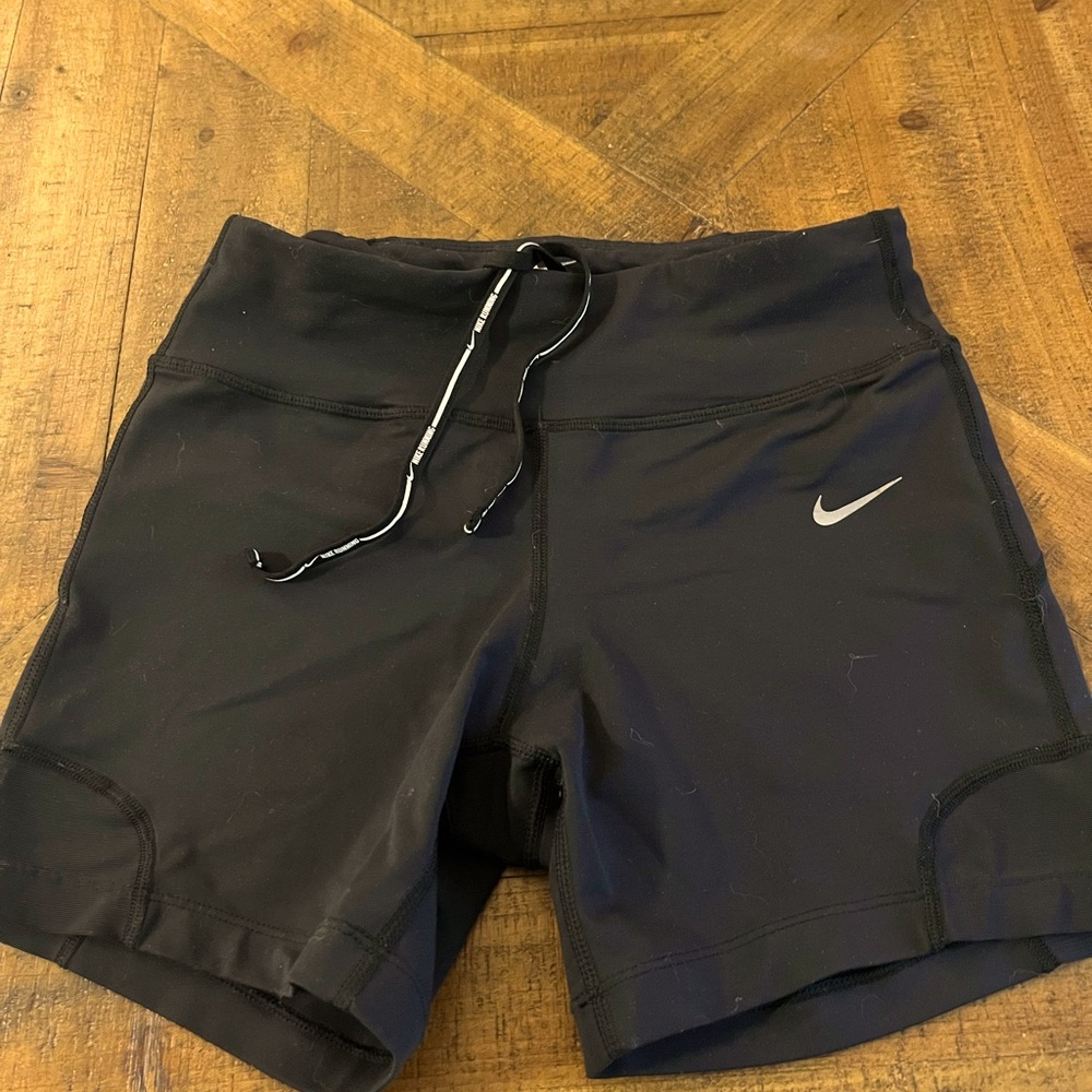 NIKE DRY FIT RUNNING SHORTS. Black. Draw string waist.